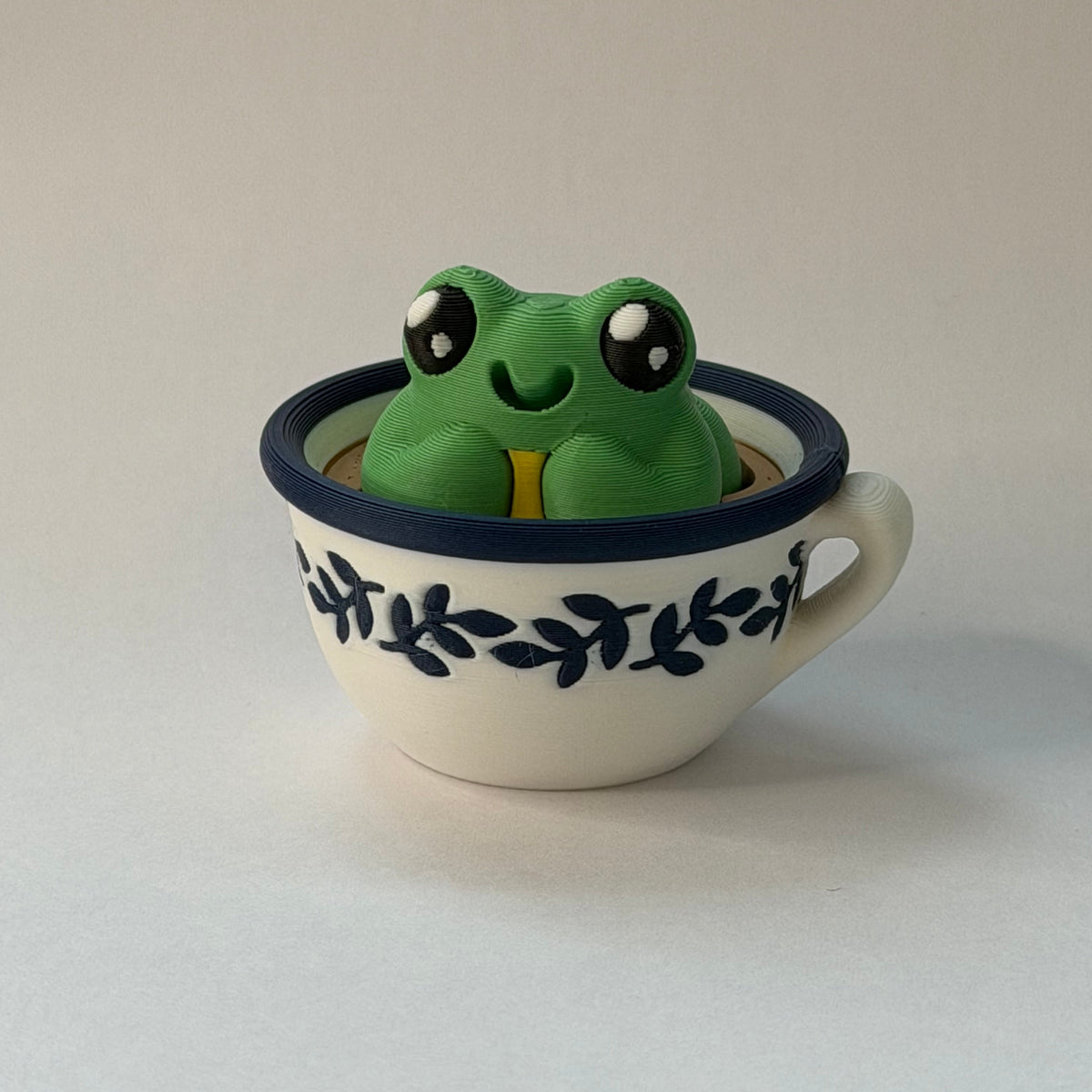 Frog in a teacup fidget clicker - Green