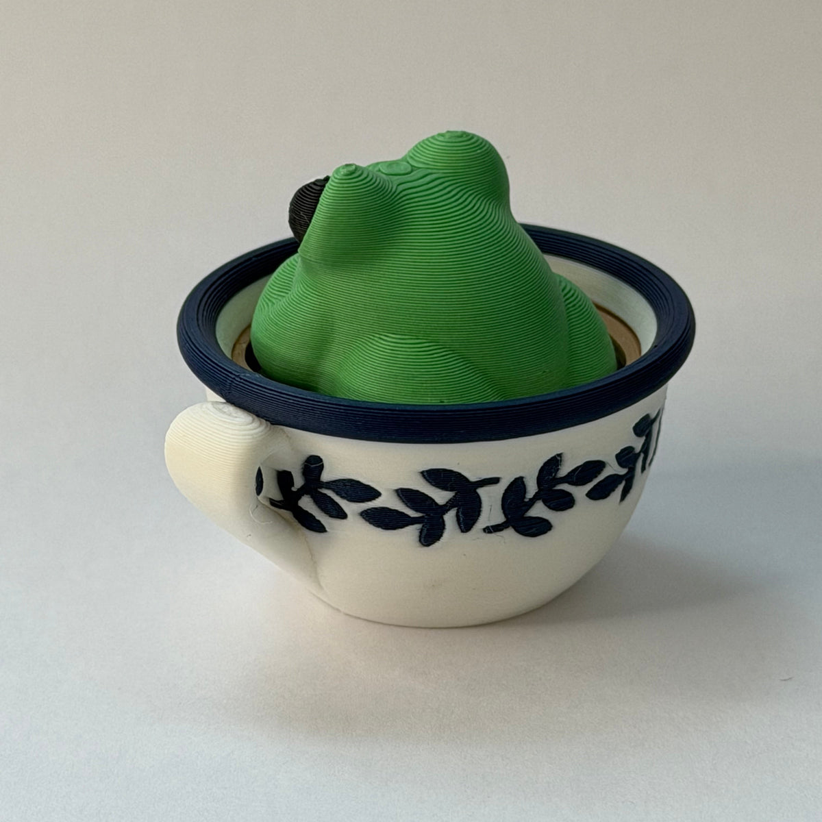 Frog in a teacup fidget clicker - Green